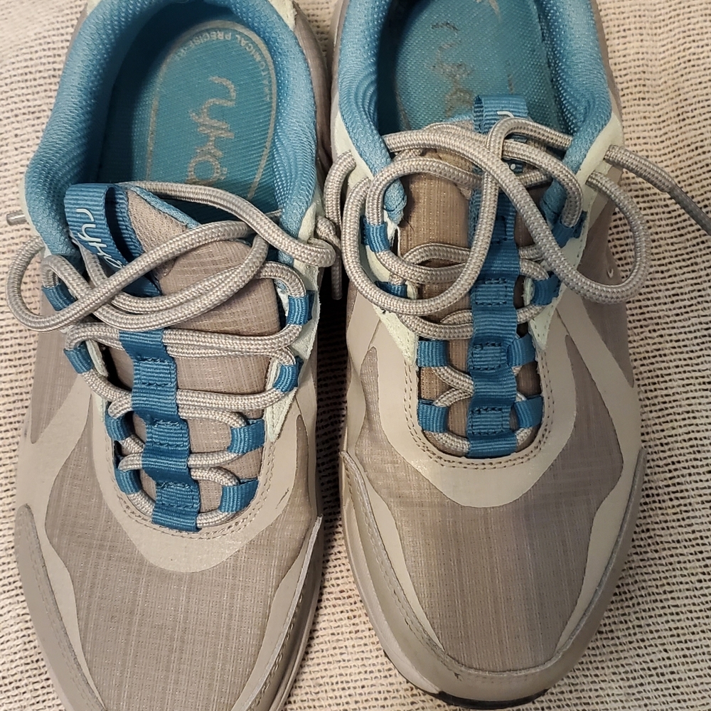 light gray and light blue shoes